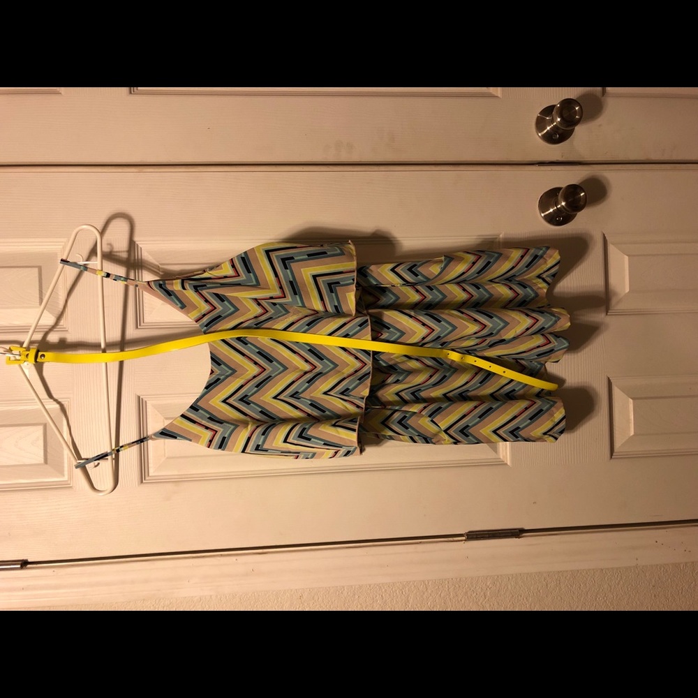 Romper with pockets, and belt .